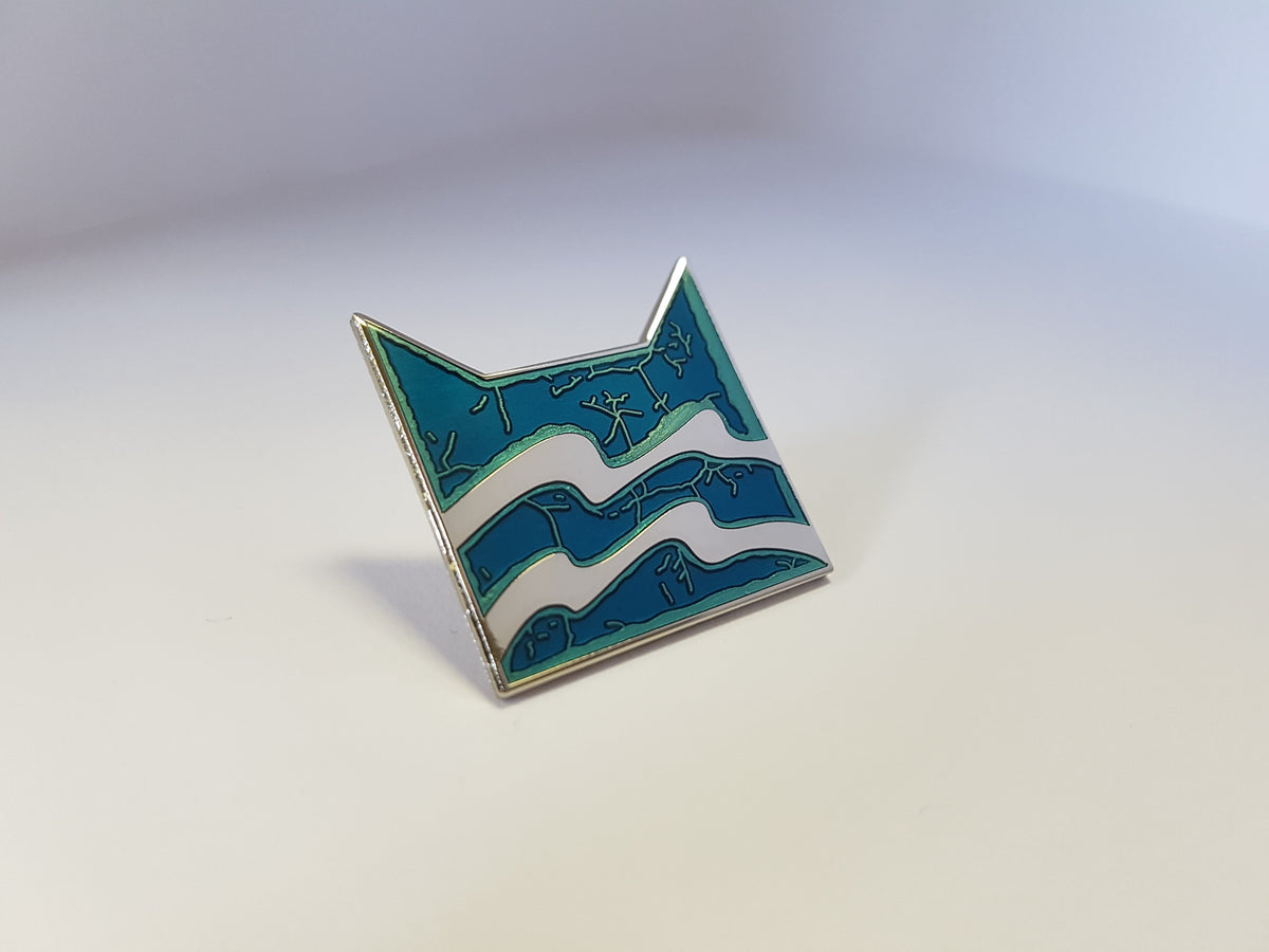 Pin coleccionable del Clan del Río